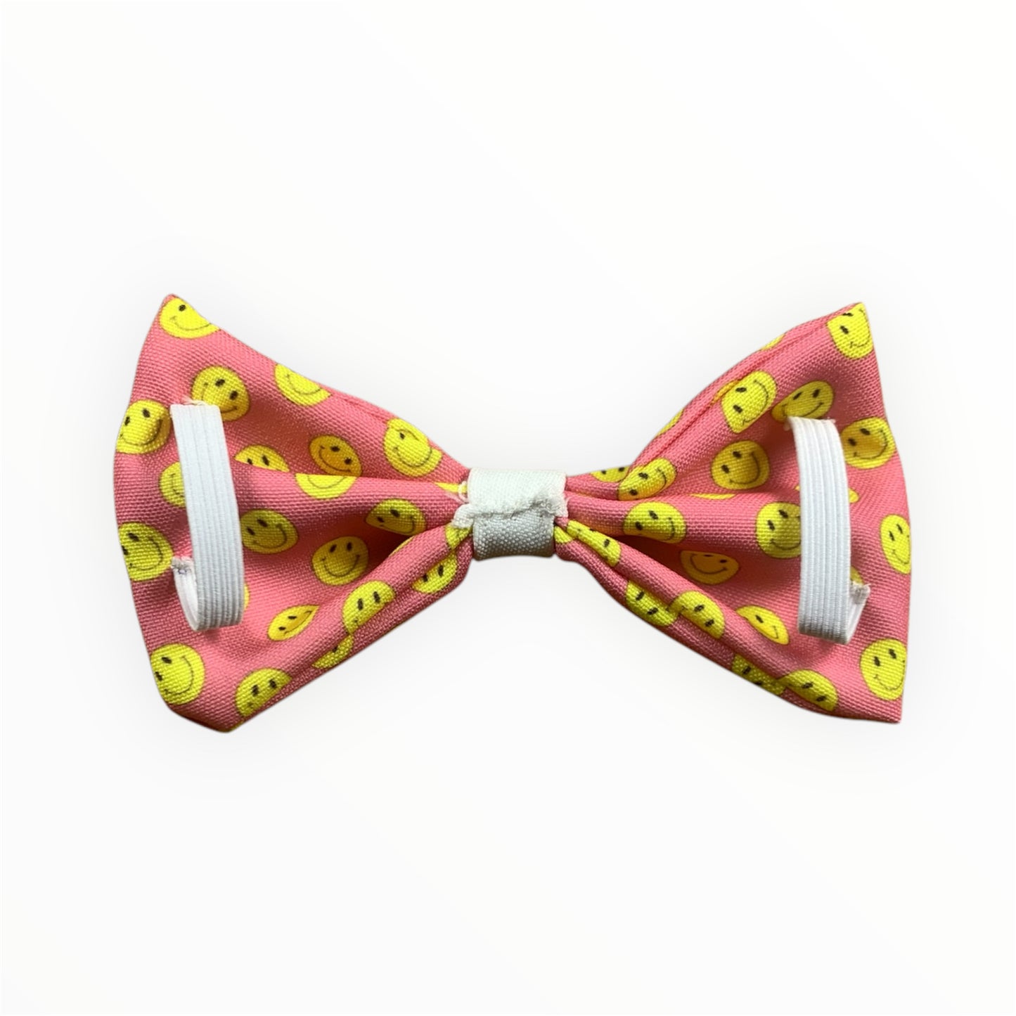 Smiley face and pink handmade dog bowtie. Exclusive design