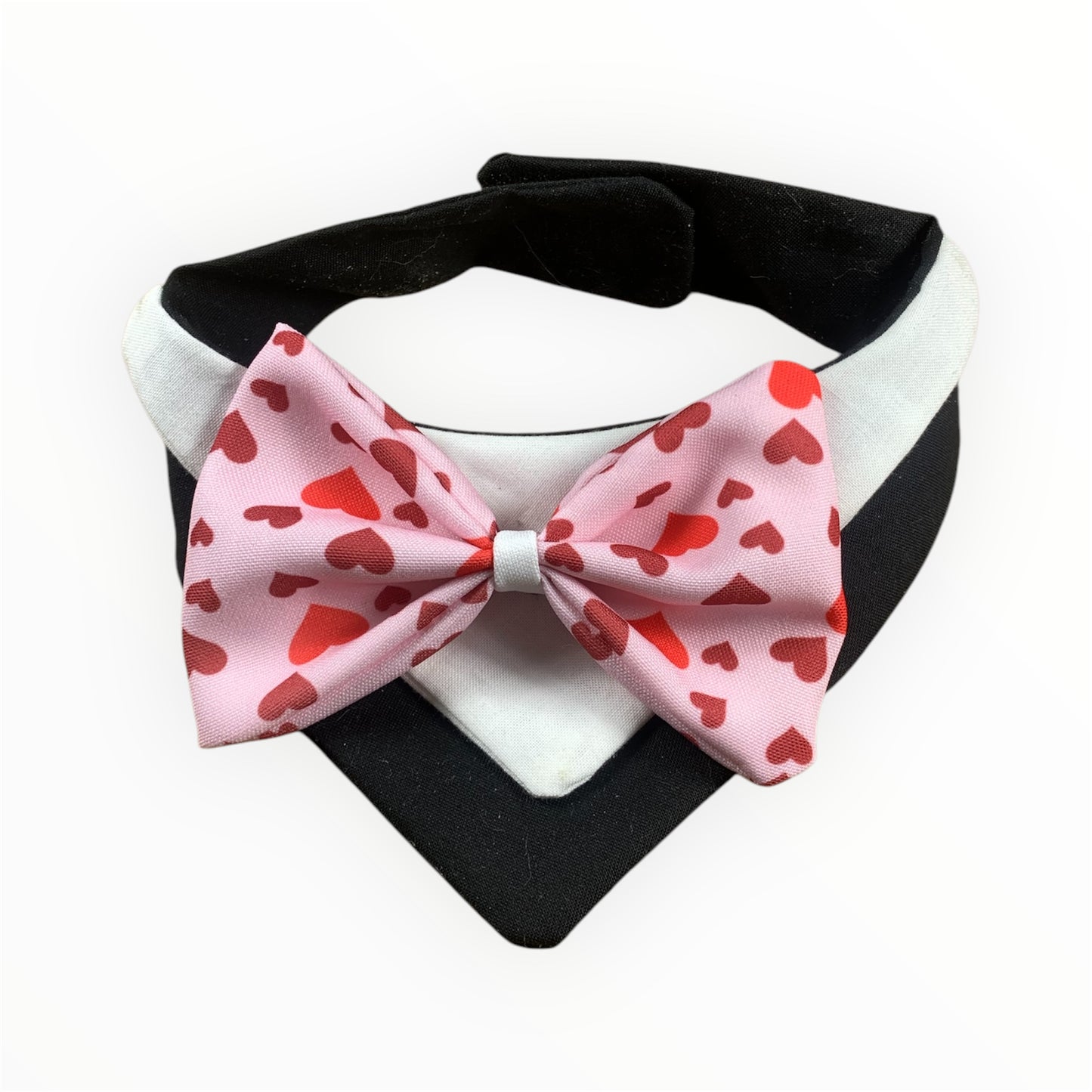 Handmade dog tuxedo with vibrant bowtie.