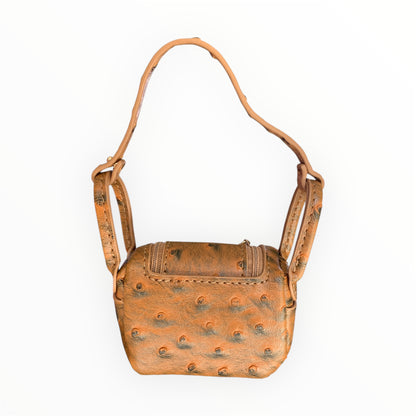 Brown ostrich design poopy bag holder for outings and walks with your dog. faux birkin barkin