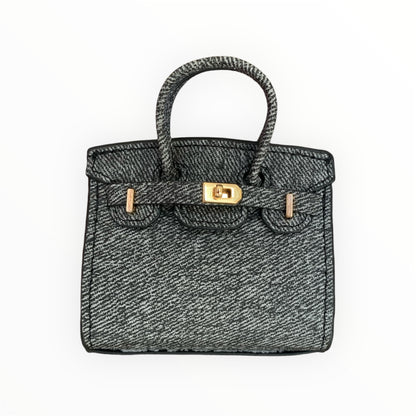 Dark grey poopy bag holder for outings and walks with your dog. 