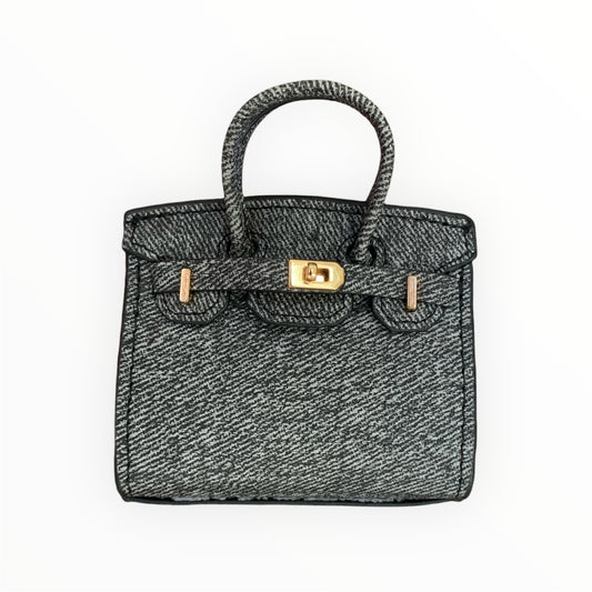 Dark grey poopy bag holder for outings and walks with your dog. 
