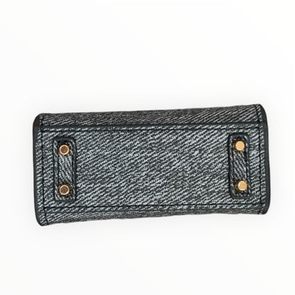 Dark grey poopy bag holder for outings and walks with your dog. 