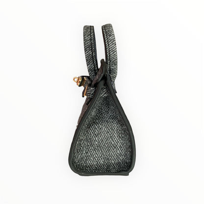 Dark grey poopy bag holder for outings and walks with your dog. 