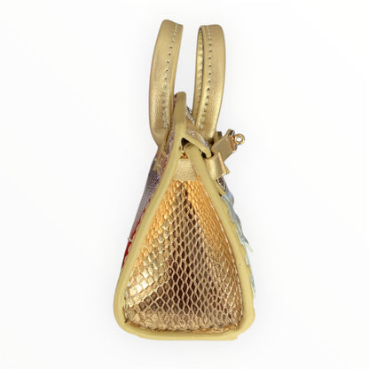 Gold poopy bag holder for outings and walks with your dog. 