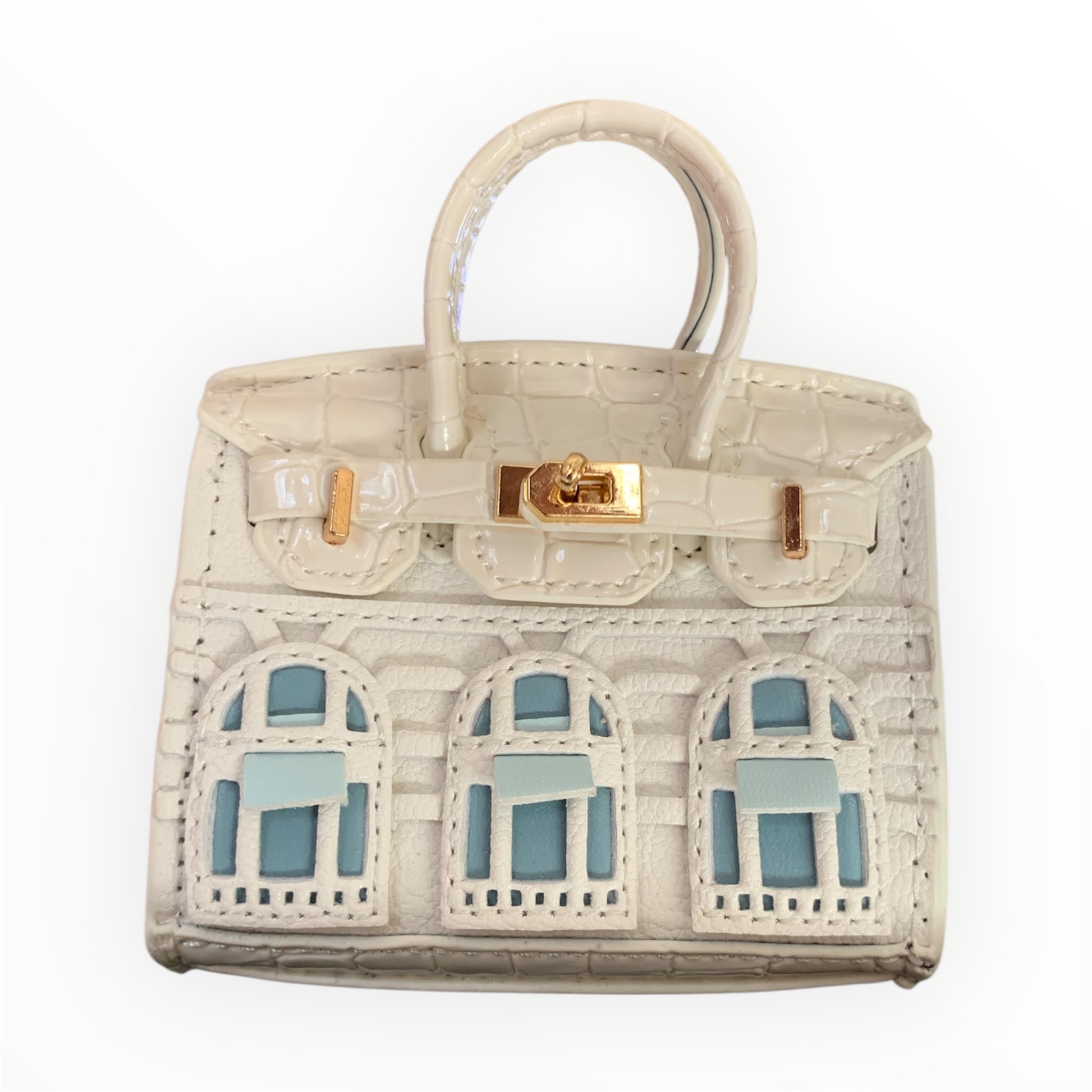 White poopy bag holder for outings and walks with your dog. 