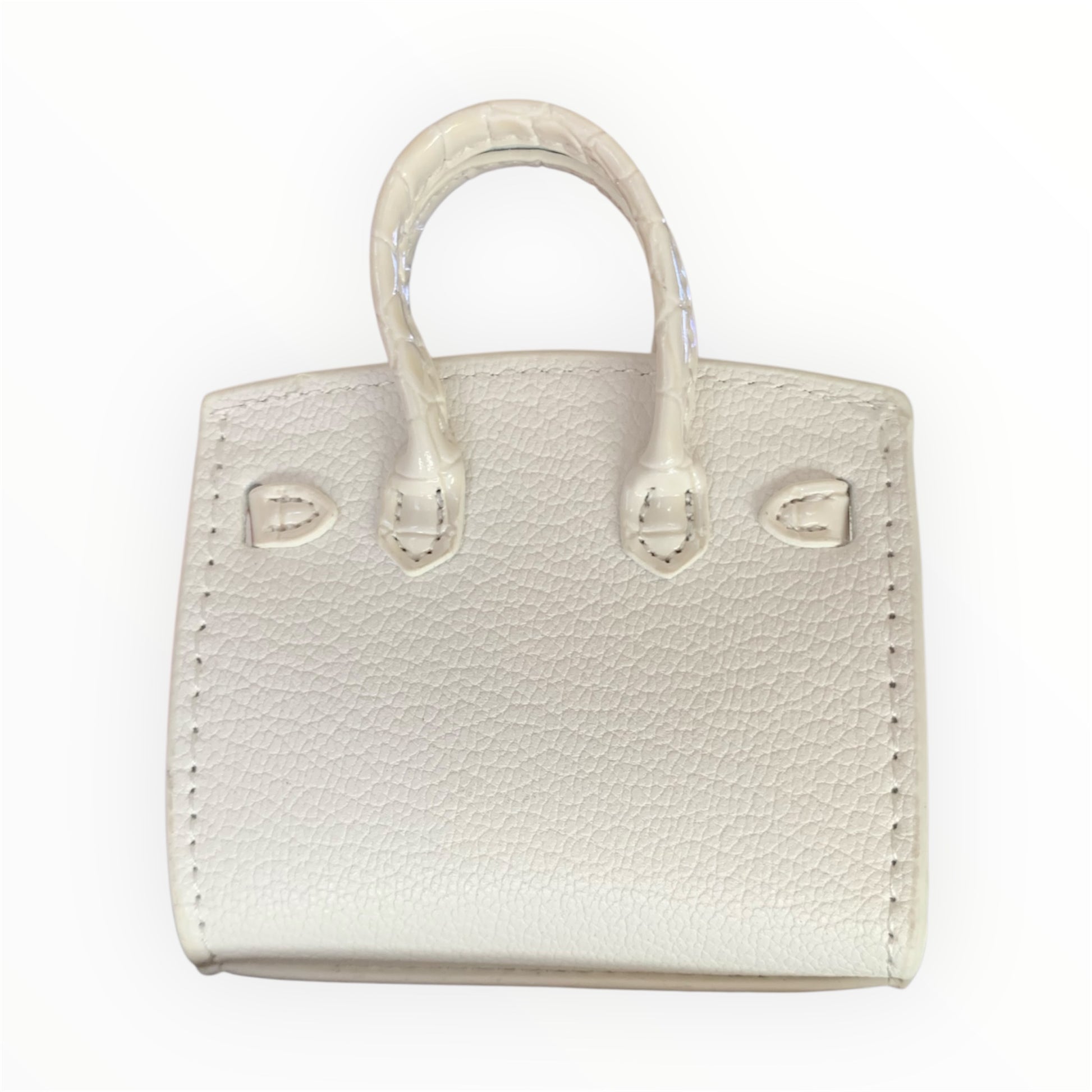 White poopy bag holder for outings and walks with your dog. 