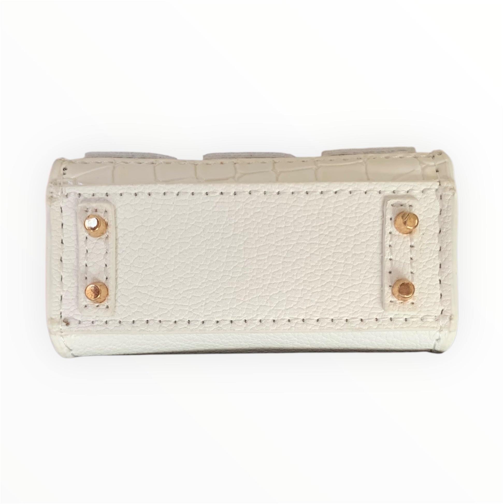 White poopy bag holder for outings and walks with your dog. 