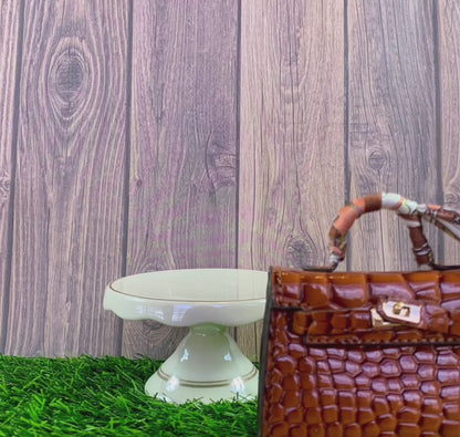 Poopy bag holder for walks or outings. Brown faux Ostrich design
